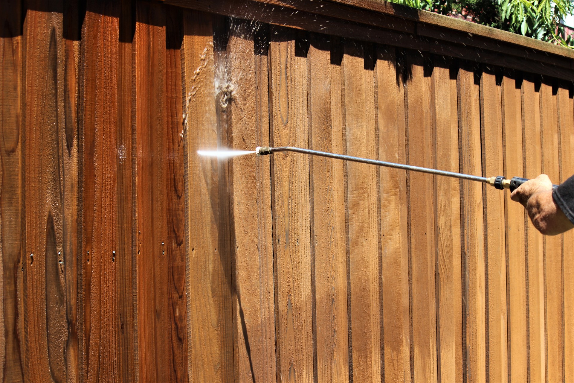 Pressure washing old fence